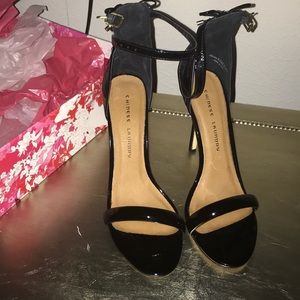 Black patent leather sandals